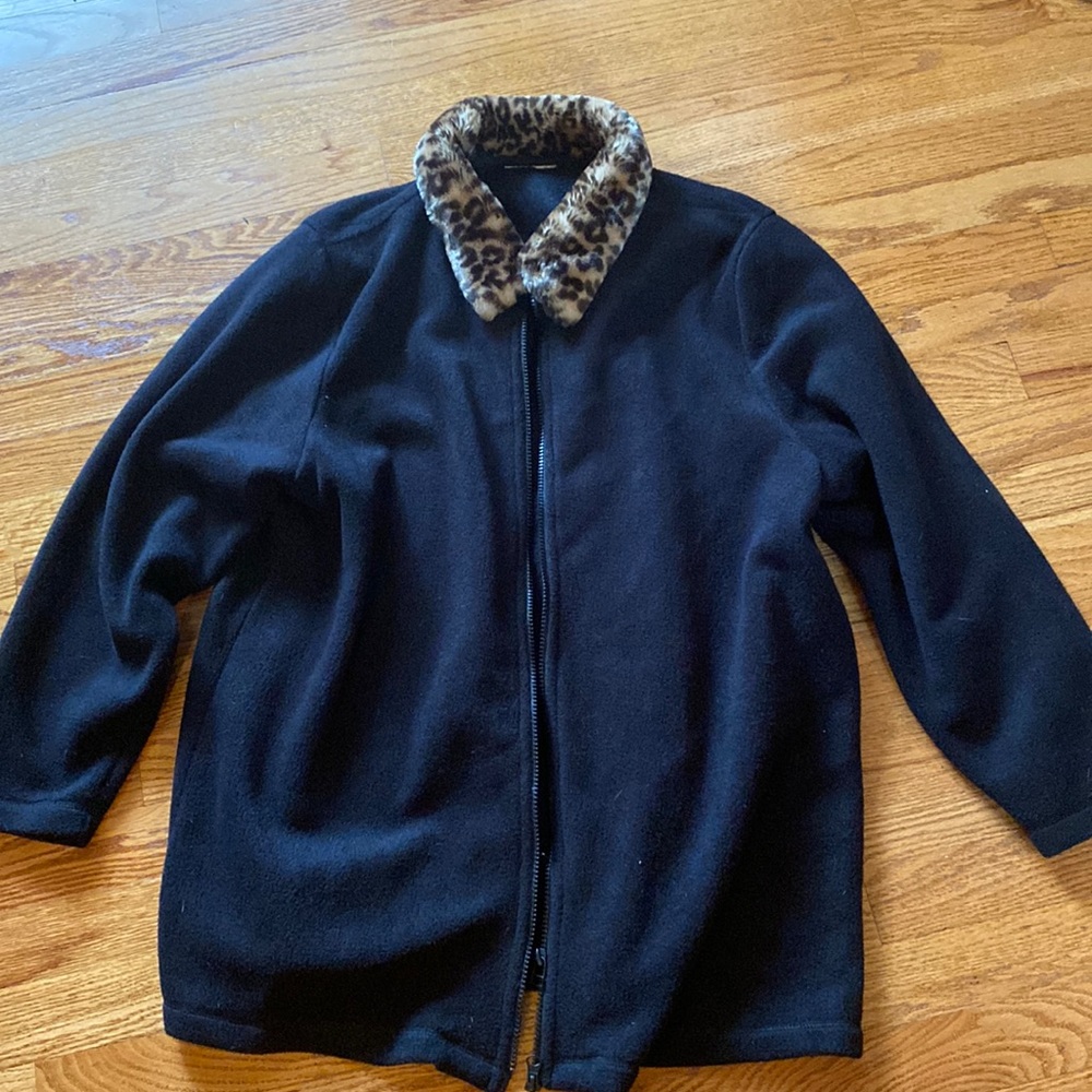 Large black jacket, faux fuzz around neck. Label missing, so guessing size.